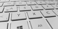 Social Trading or Copy Trading Close-up of white computer keyboard - Copy Trading